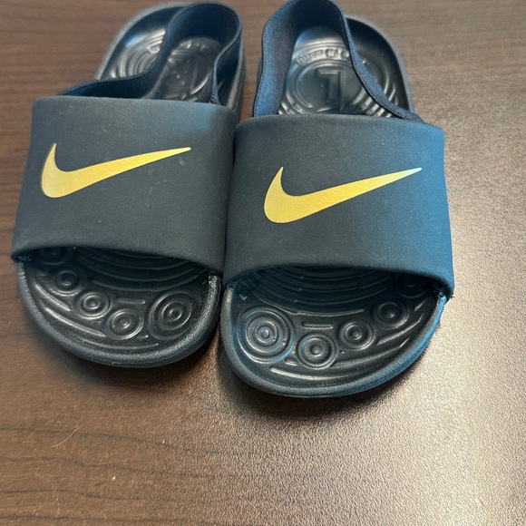 Nike Black Slides with Gold Swoosh - Picture 1 of 2